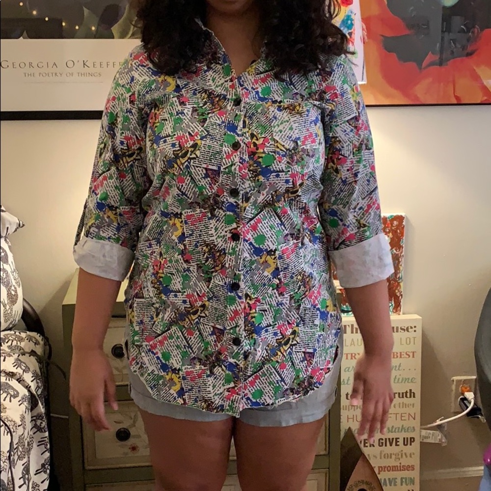 A button down high low shirt.